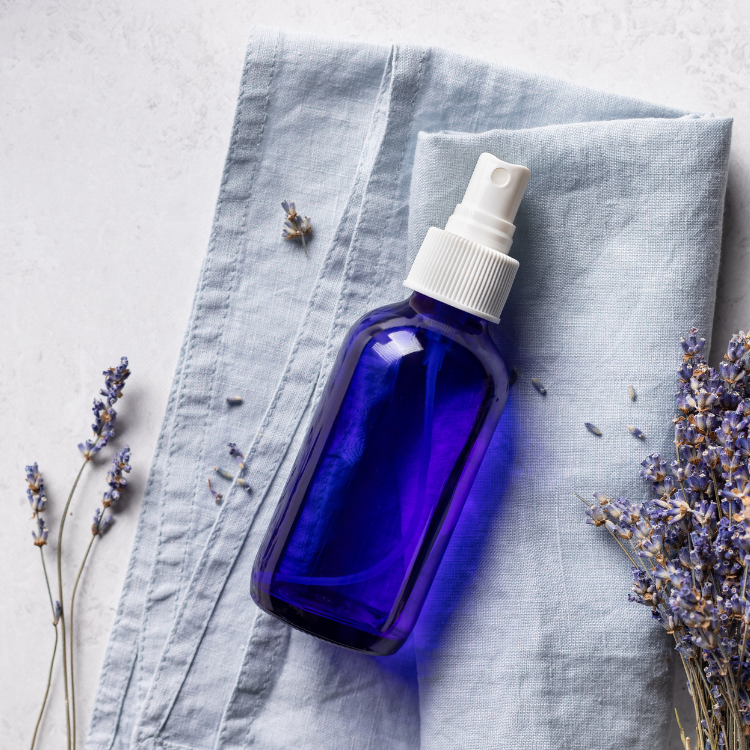 blue glass essential oil spray bottle